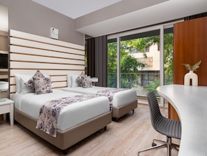 Habitación Deluxe con 2 camas individuales | 1 habitación, ropa de cama de alta calidad y minibar 