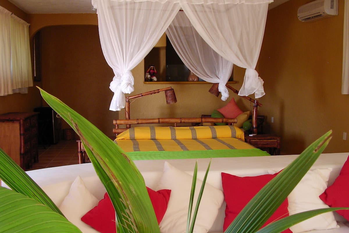 Suite Deluxe, 1 cama King size, vista a la alberca | Vista desde la habitación