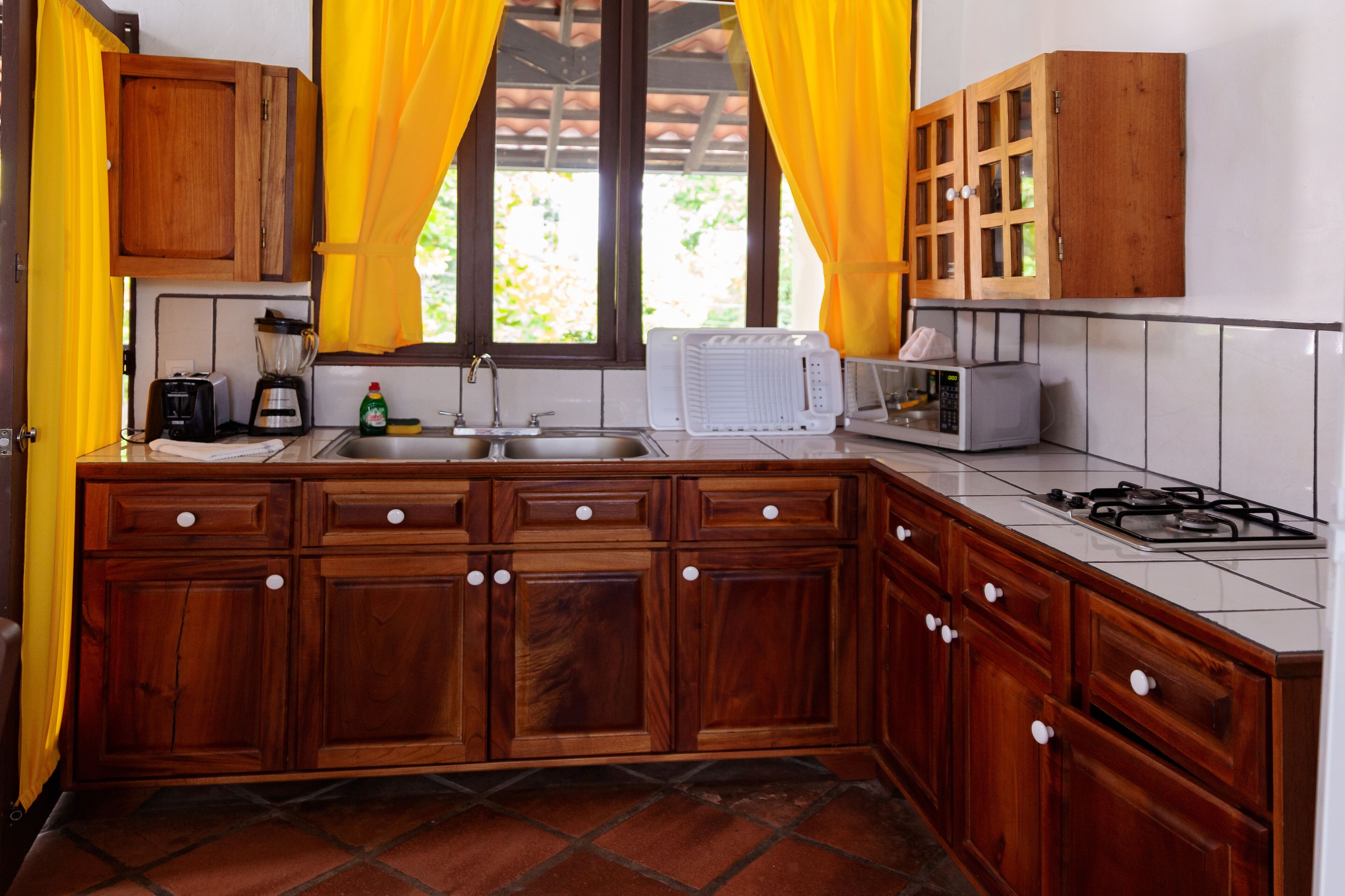 deluxe villa, 2 bedrooms, pool view | private kitchen | fridge, microwave, stovetop, coffee/tea maker