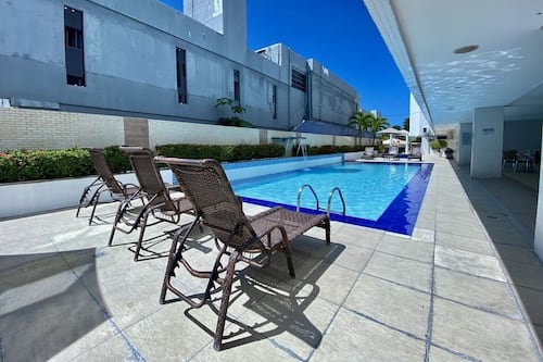 Outdoor pool, pool umbrellas, sun loungers