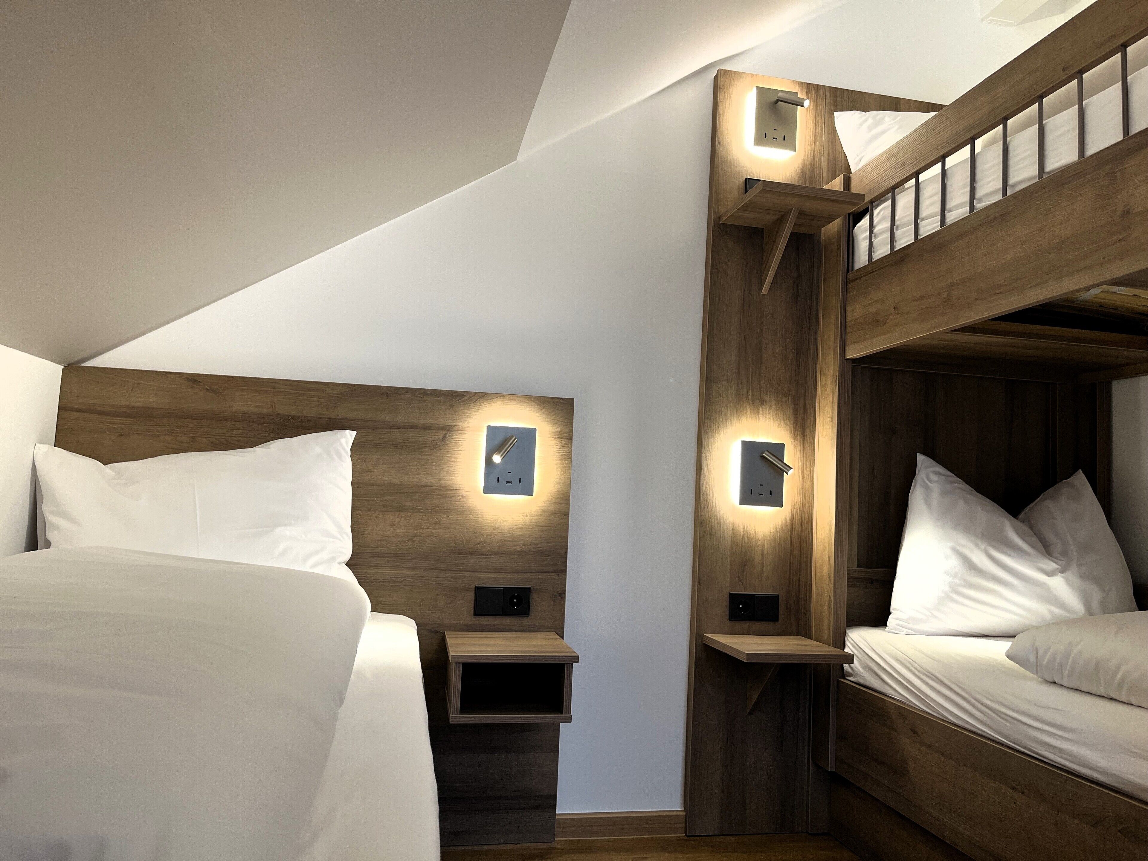 family room | premium bedding, laptop workspace, soundproofing, cots/infant beds