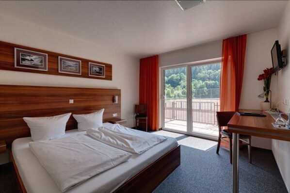 Desk, laptop workspace, free WiFi, bed sheets