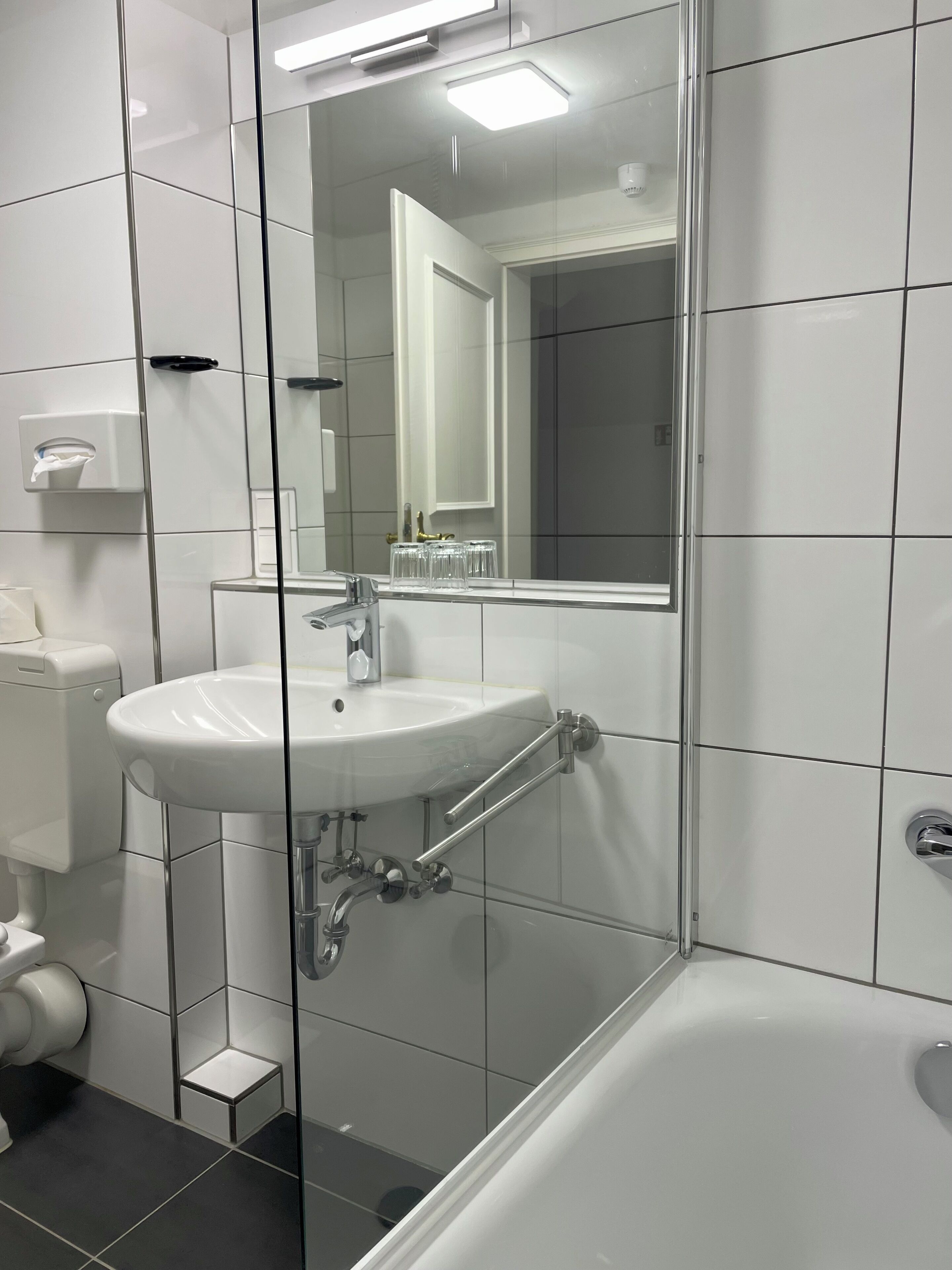 eco-friendly toiletries, hair dryer, towels, soap