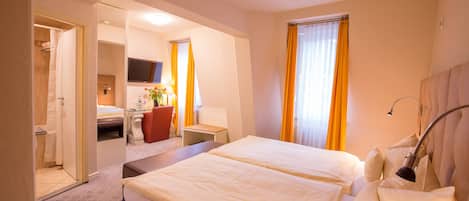 Comfort Double Room | Premium bedding, in-room safe, desk, soundproofing