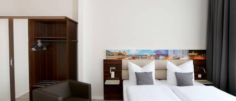 Desk, blackout curtains, free WiFi, bed sheets