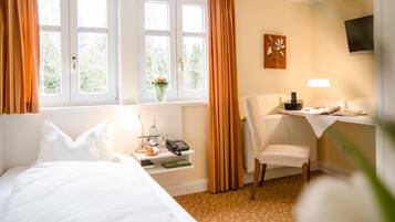 Desk, free WiFi, bed sheets