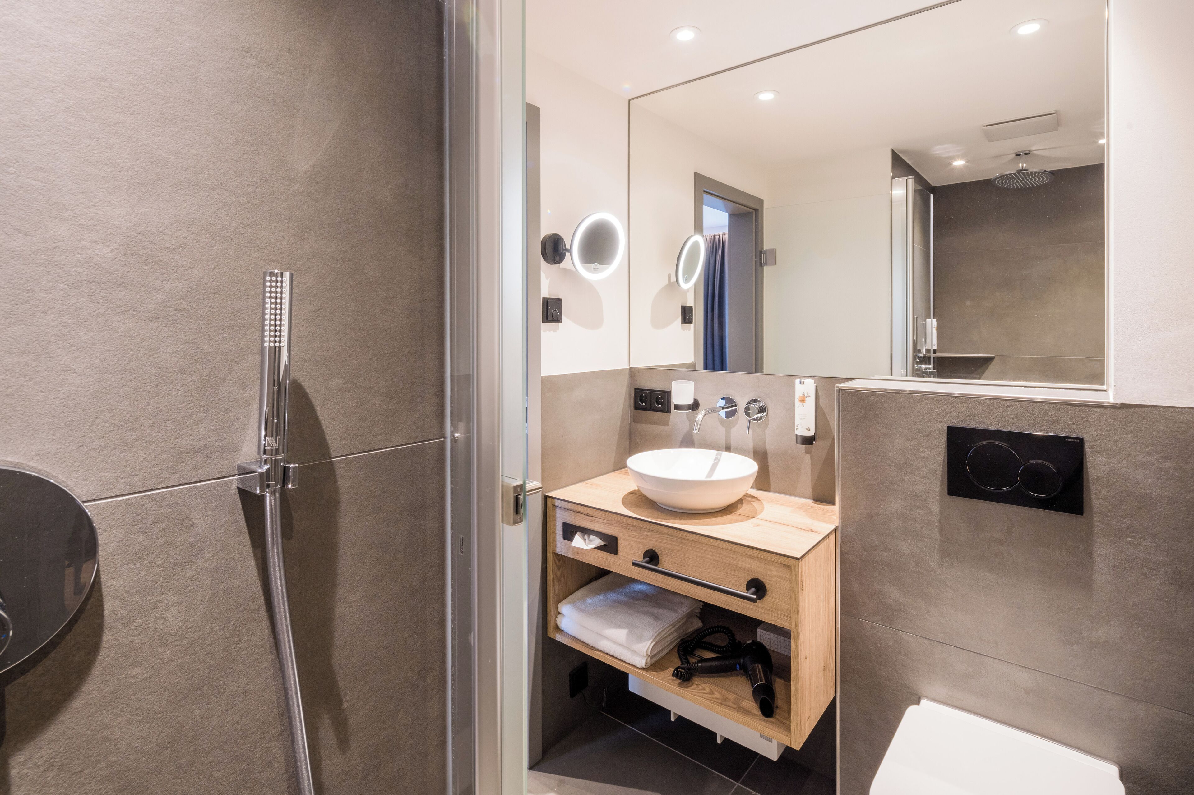 shower, free toiletries, hair dryer, towels