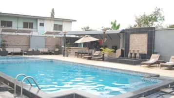 Outdoor pool, pool umbrellas, sun loungers