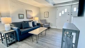 Family Apartment, Multiple Beds, Kitchen | Living area | TV