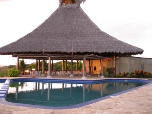 2 outdoor pools, an infinity pool, sun loungers