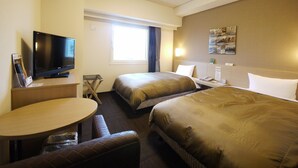 A hotel room with two beds, a TV, a desk, and a window. - Hotel Route-Inn Sendai Taiwa Inter (Taiwa)