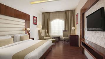 Executive Room, 1 King Bed | Premium bedding, minibar, in-room safe, individually furnished