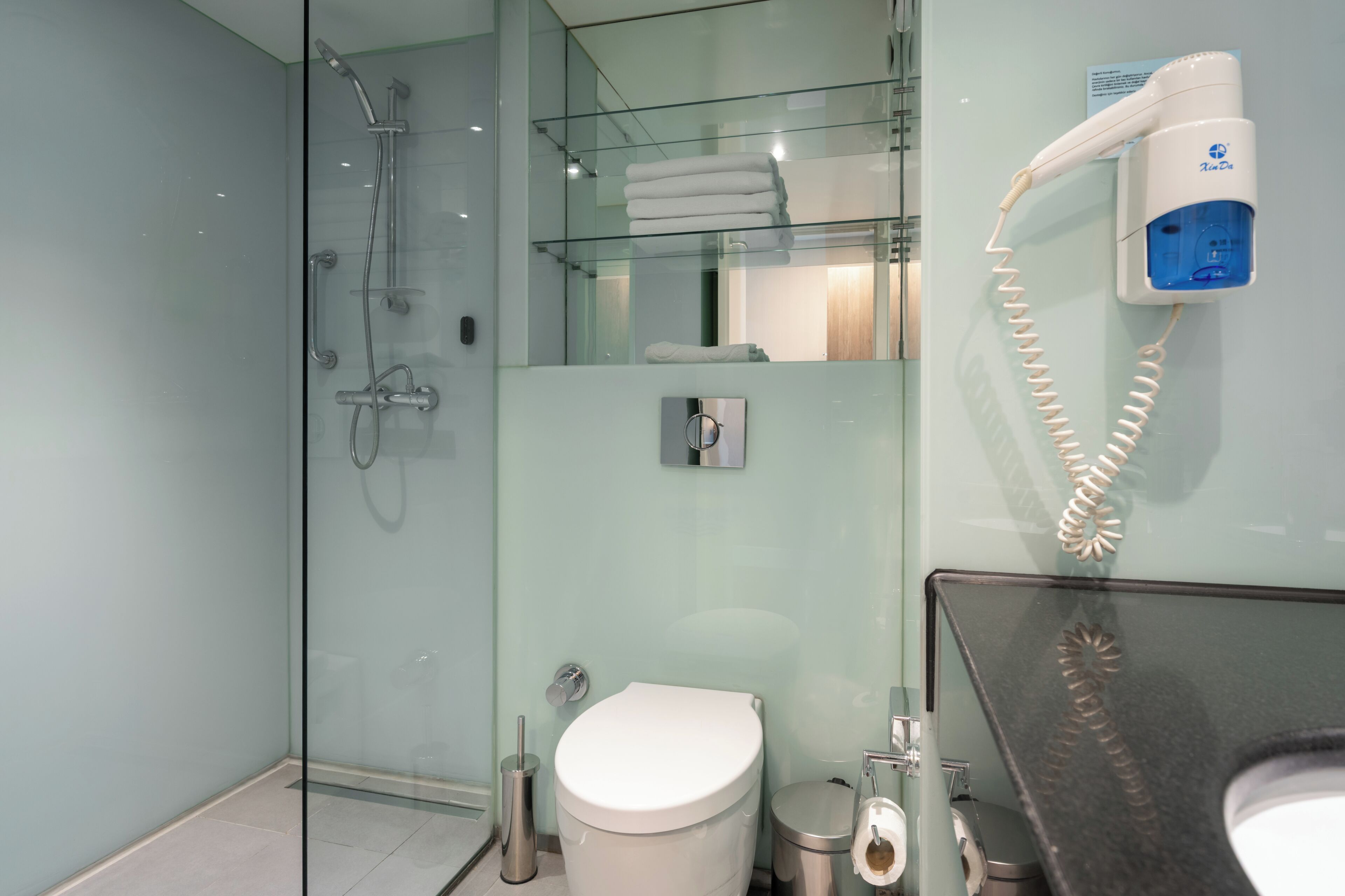 Shower, free toiletries, hair dryer, slippers