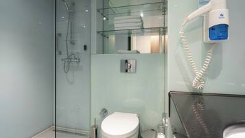 Shower, free toiletries, hair dryer, slippers