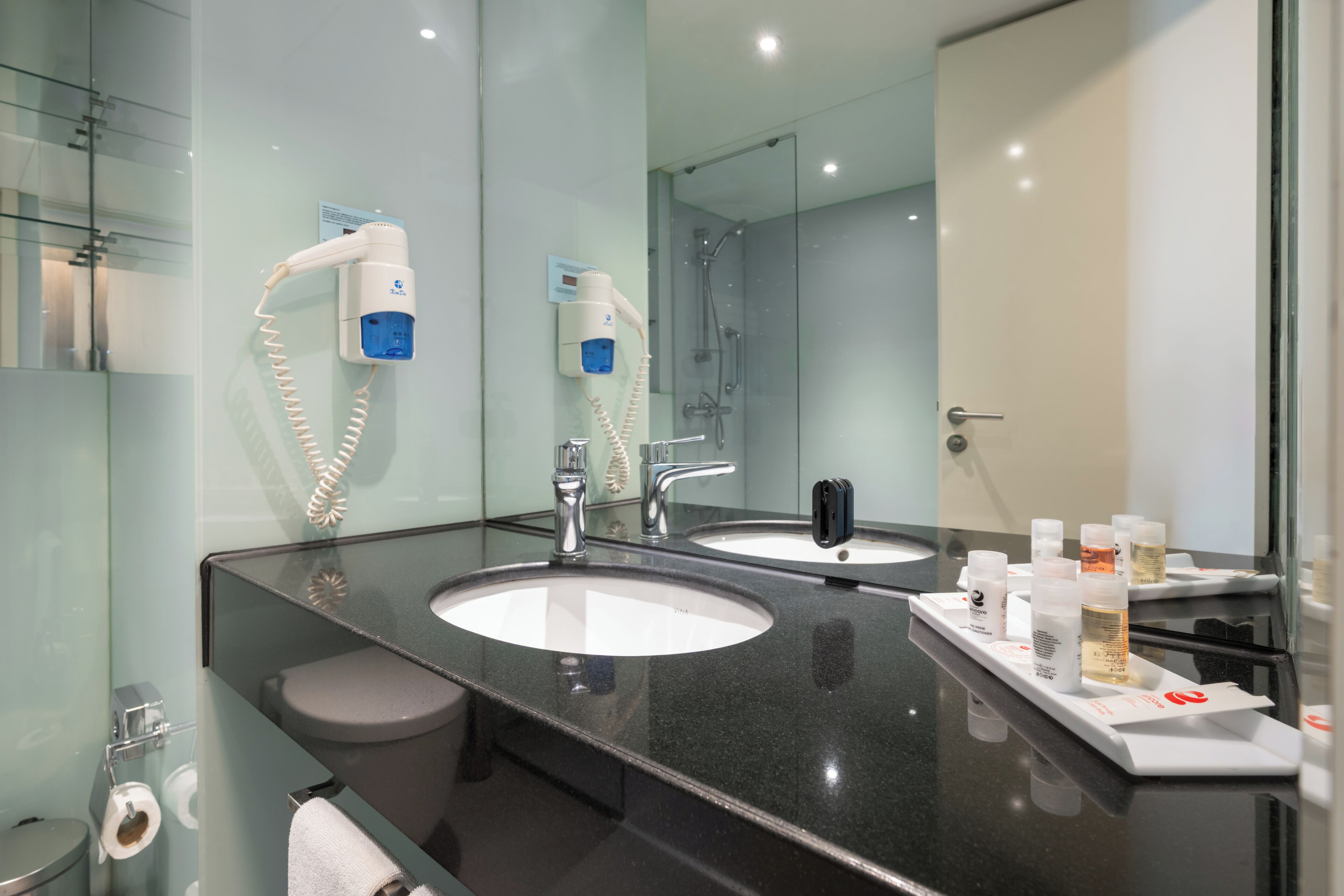 Shower, free toiletries, hair dryer, slippers