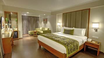 Suite estudio ejecutiva | 1 dormitorio, ropa de cama de alta calidad, minibar y caja fuerte