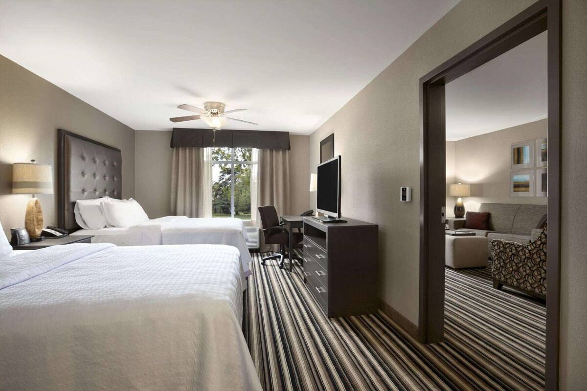 Desk, laptop workspace, blackout curtains, iron/ironing board