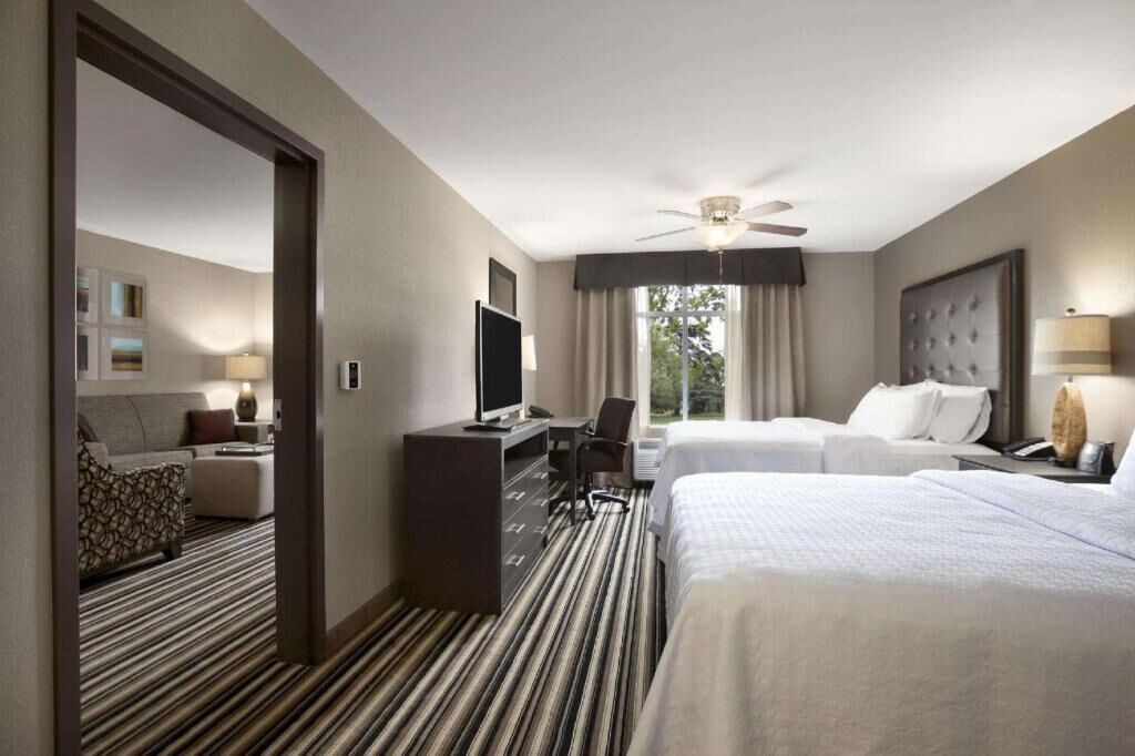 Desk, laptop workspace, blackout curtains, iron/ironing board