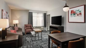 Suite, 2 Queen Beds, Corner | Living area | 42-inch TV with digital channels
