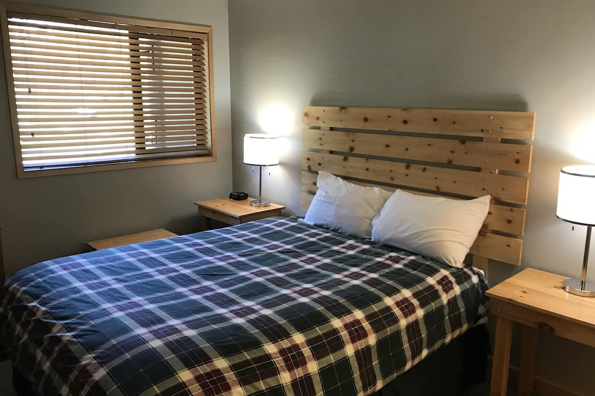 Condo, 1 Bedroom (Unit 203) | 1 bedroom, individually decorated, individually furnished, free WiFi