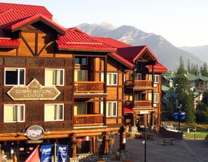 The Cornerstone Lodge with multiple balconies and a sign indicating it's a lodge.