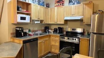 Premium Condo, 2 Bedrooms | Private kitchen | Full-sized fridge, microwave, dishwasher, coffee/tea maker