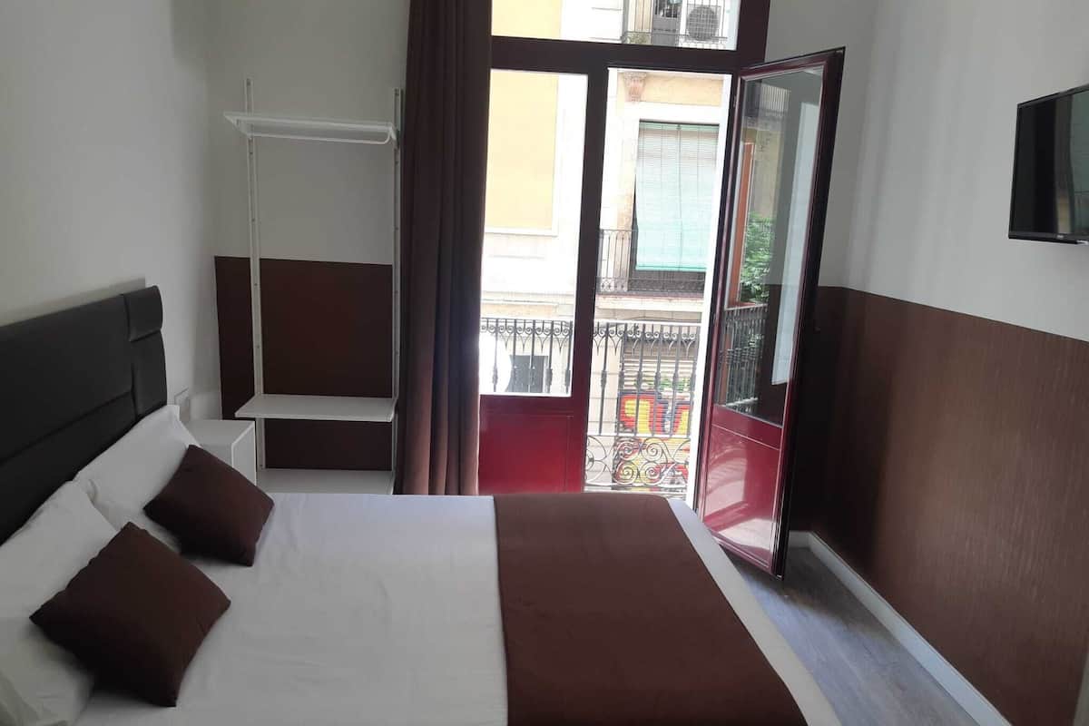 Blackout curtains, free WiFi, bed sheets
