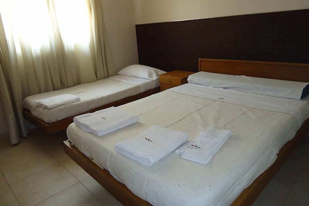 Triple Room (1 Double and 1 Single Bed)