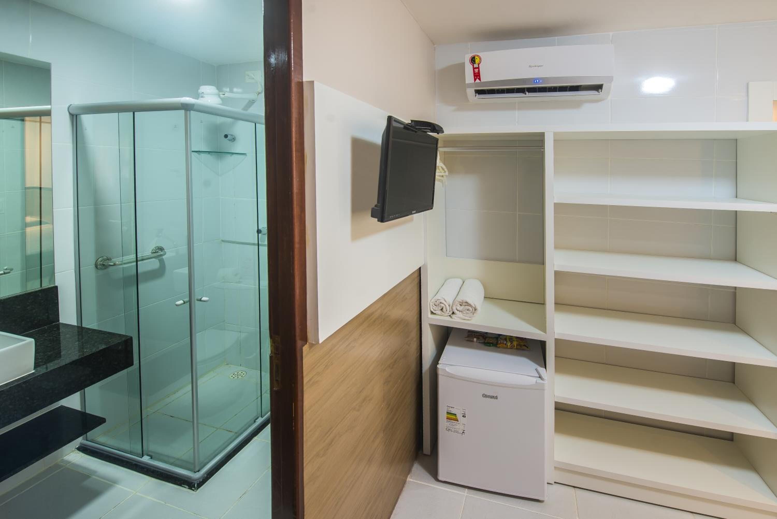 shower, free toiletries, hair dryer, towels