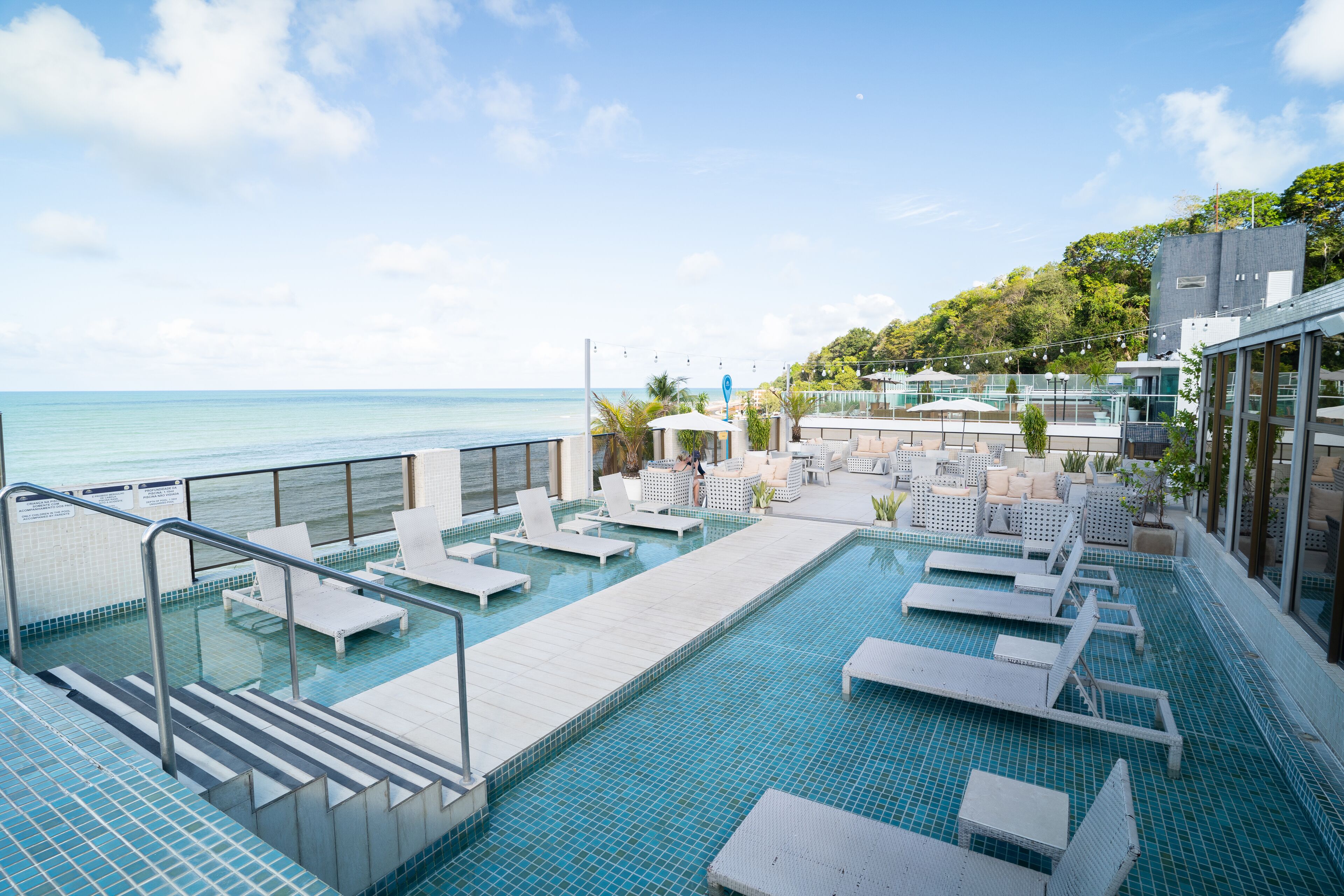 outdoor pool, pool umbrellas, pool loungers