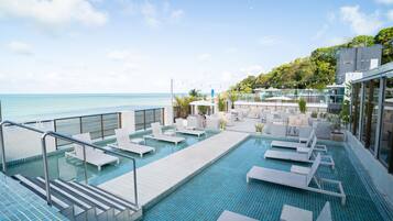 Outdoor pool, pool umbrellas, pool loungers