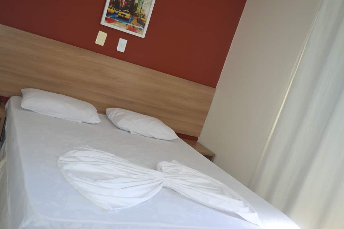 Habitación estándar | Cortinas blackout, camas extra, wifi gratis y ropa de cama