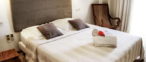 Superior Room | Minibar, blackout drapes, iron/ironing board, rollaway beds