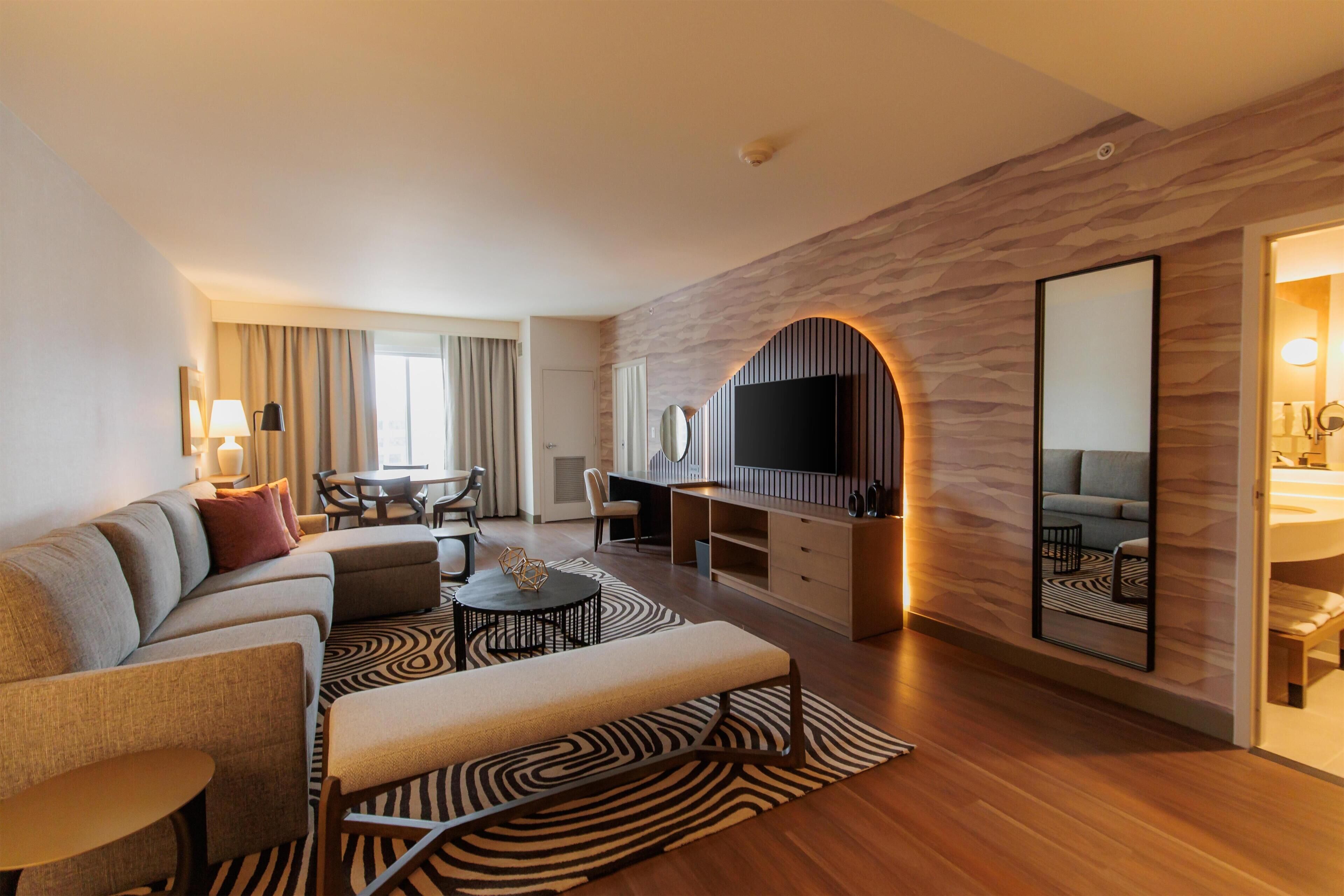 Suite, 1 King Bed, River View (Governor's) | Living area | 42-inch LCD TV with cable channels, TV, pay films