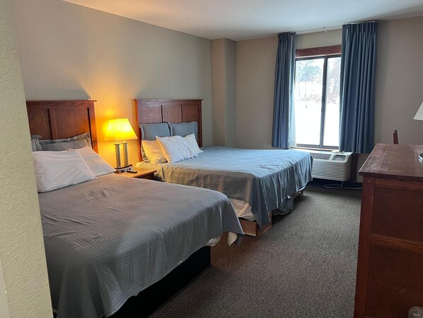 Room, 1 King Bed & 1 Queen Bed | In-room safe, desk, iron/ironing board, free WiFi