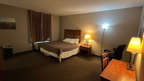 Room, 1 King Bed | In-room safe, desk, iron/ironing board, free WiFi