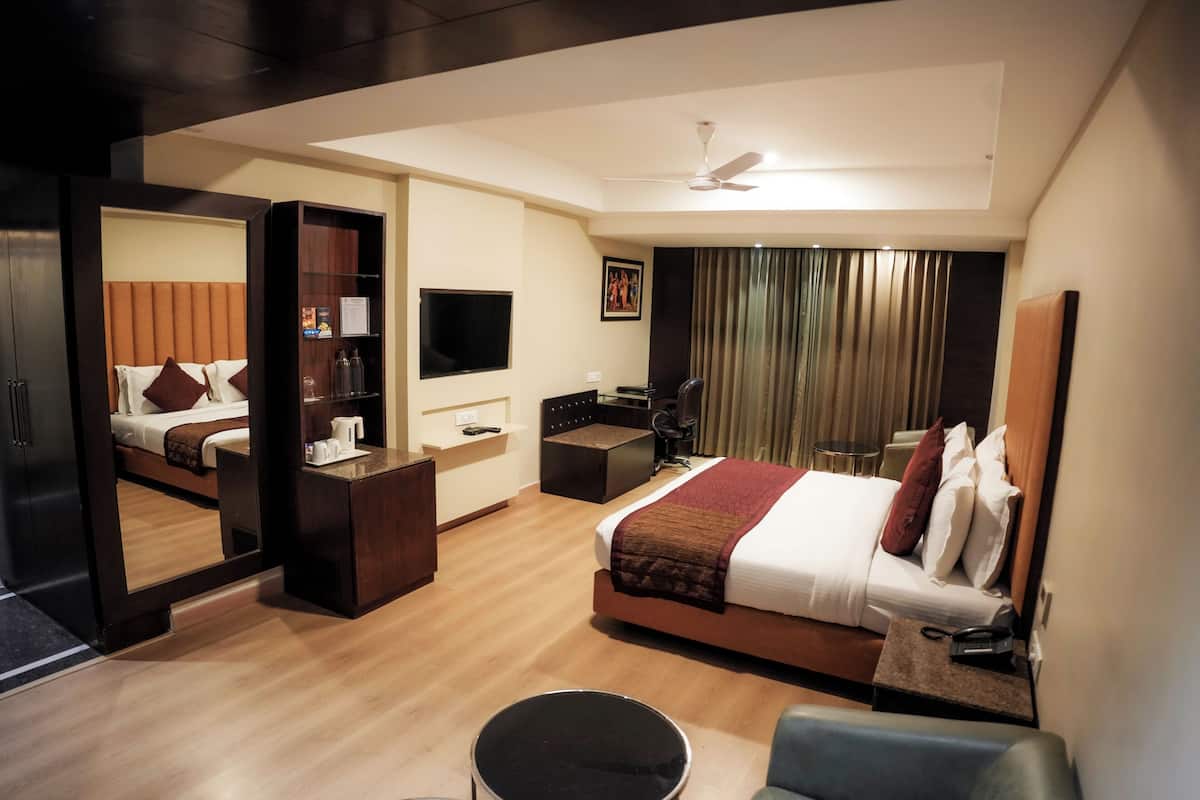 Premium bedding, memory-foam beds, minibar, in-room safe