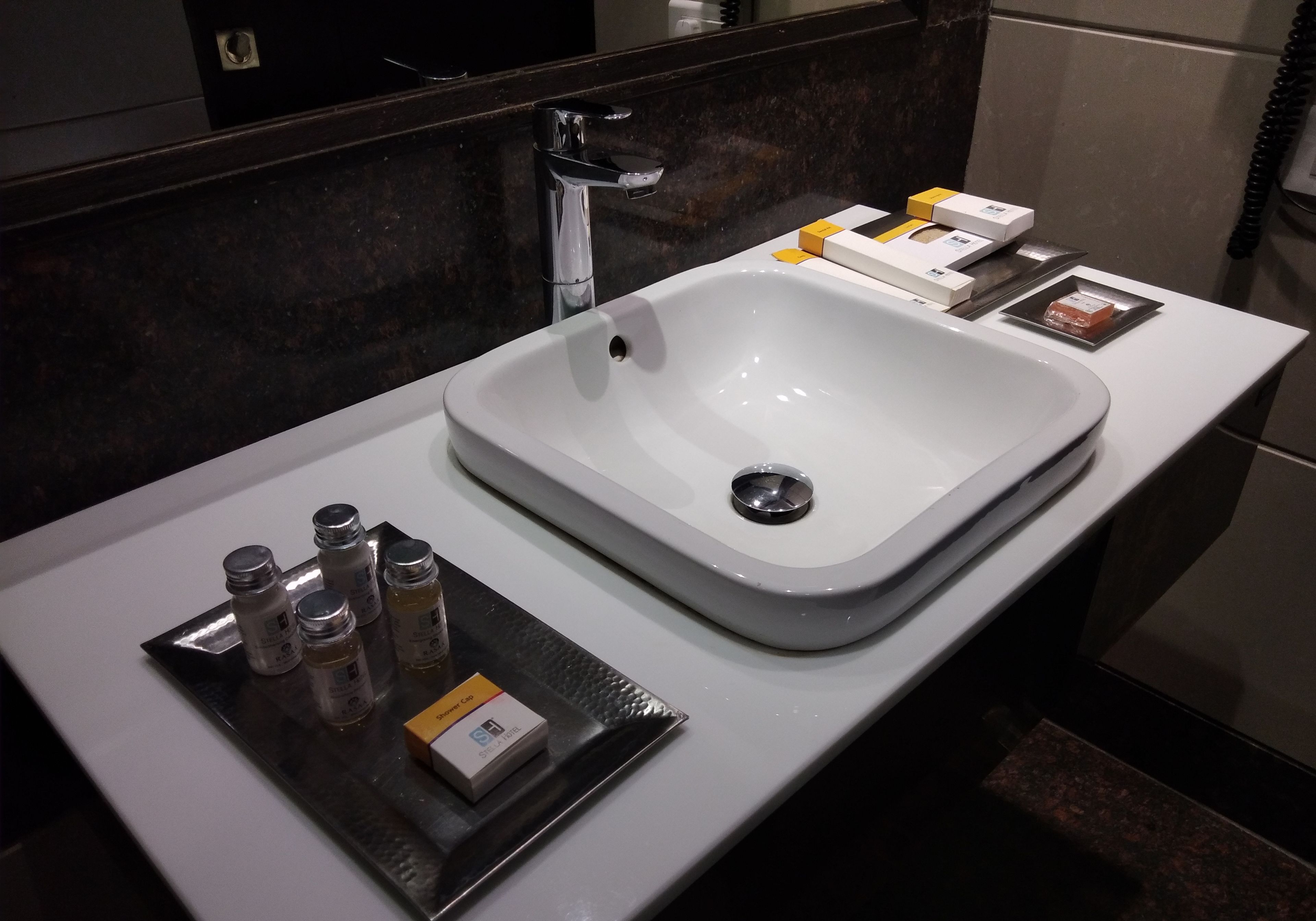 royal suite | bathroom | combined shower/bathtub, designer toiletries, hair dryer, slippers