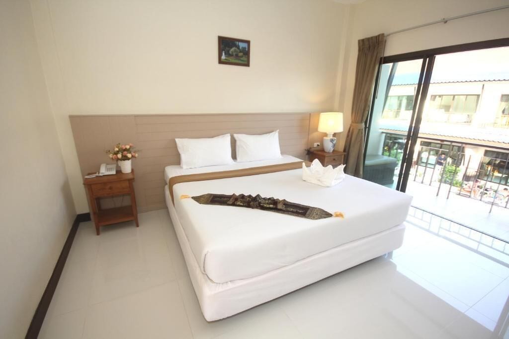 pool view double bed | premium bedding, select comfort beds, in-room safe, desk