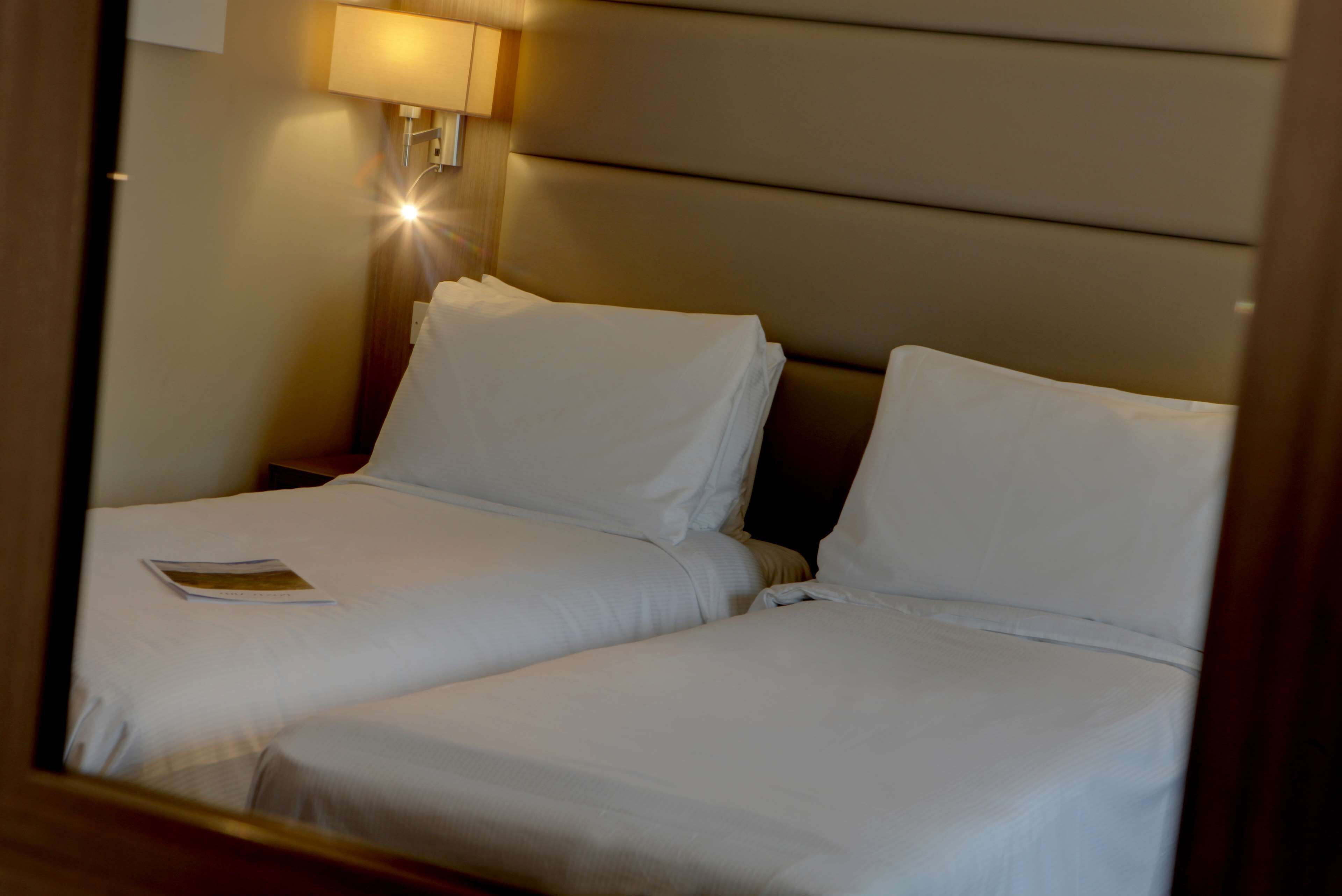 standard room, 2 single beds, accessible, non smoking | 1 bedroom, desk, laptop workspace, iron/ironing board