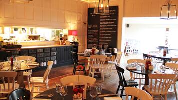 Breakfast, lunch, dinner served; British cuisine, al fresco dining