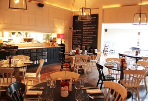 Breakfast, lunch, dinner served; British cuisine, al fresco dining 