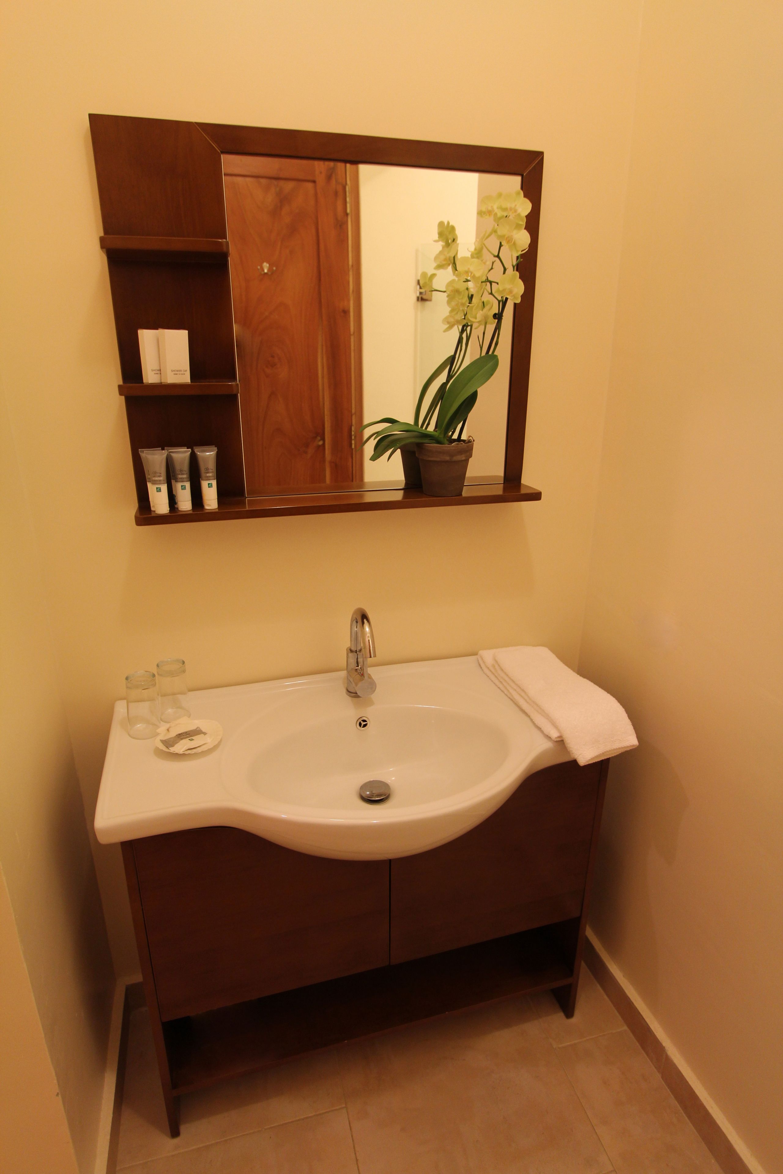 room, multiple beds, pool view | bathroom sink