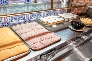 Free daily buffet breakfast