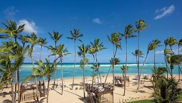 On the beach, sun loungers, beach umbrellas, beach towels