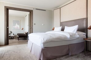 Hypo-allergenic bedding, down comforters, minibar, in-room safe