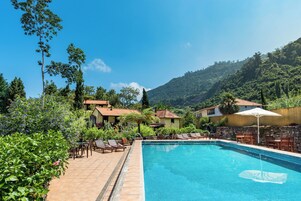 Outdoor pool, pool umbrellas, sun loungers