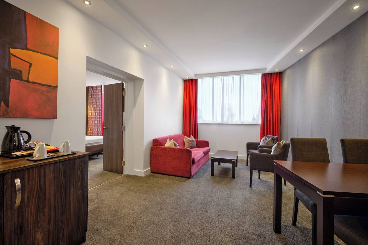 suite, 1 bedroom | 1 bedroom, in-room safe, desk, blackout curtains
