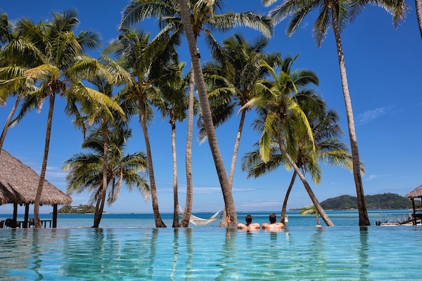 Outdoor pool, pool umbrellas, sun loungers