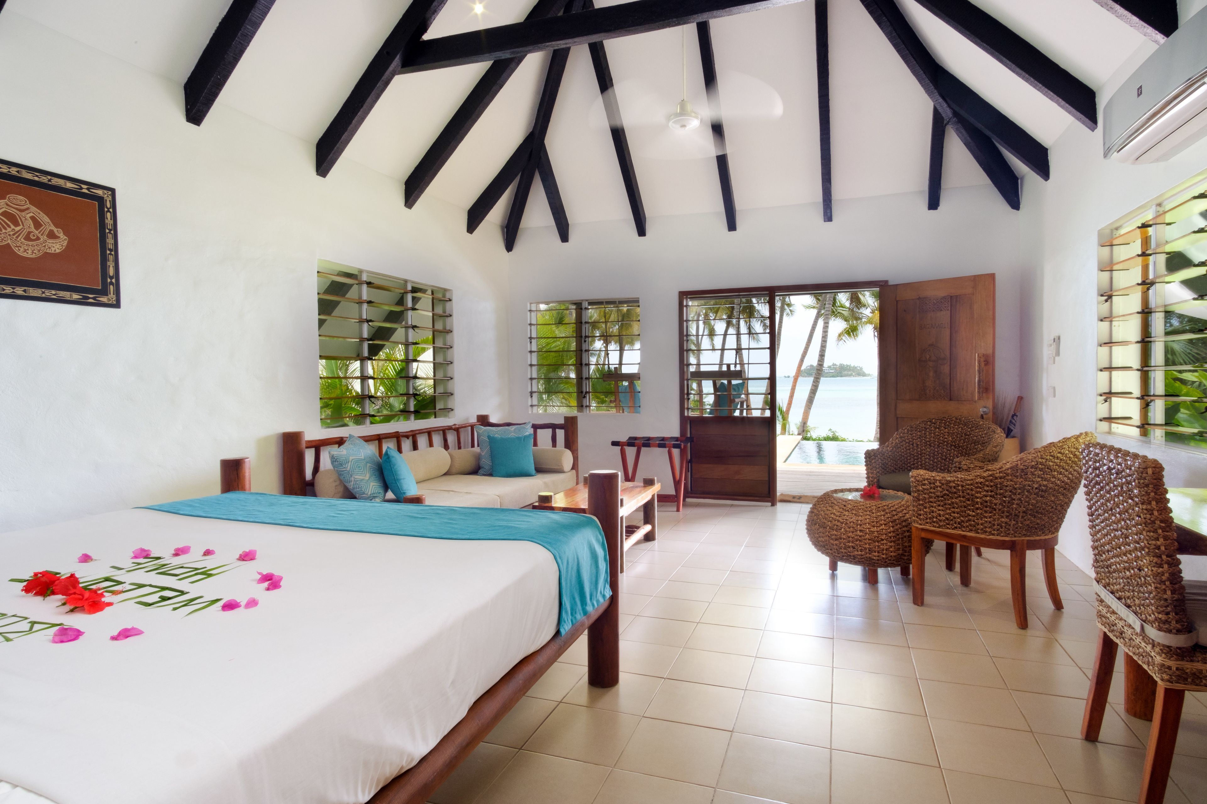 Beachfront Pool Bure | Premium bedding, in-room safe, individually decorated